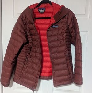 Patagonia Women's Hooded Puffer Jacket in Cabernet and Red